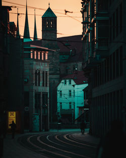 Buildings in city at night