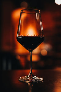 Close-up of wineglass on table