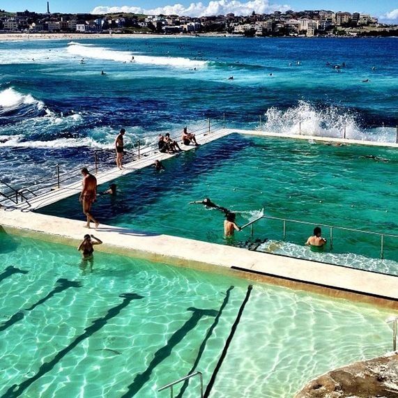 water, leisure activity, sea, lifestyles, swimming, men, enjoyment, vacations, high angle view, blue, turquoise colored, nature, fun, summer, person, large group of people, day, wave, waterfront