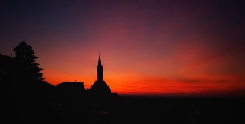 Silhouette of church at sunset