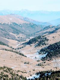 Aerial view of landscape and mountains against sky