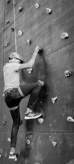 The man doing rock climbing 