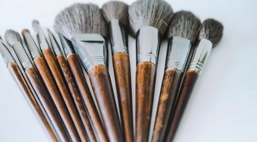 High angle view of vegetables on table against white background