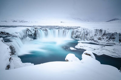 Scenic view of waterfall during winter