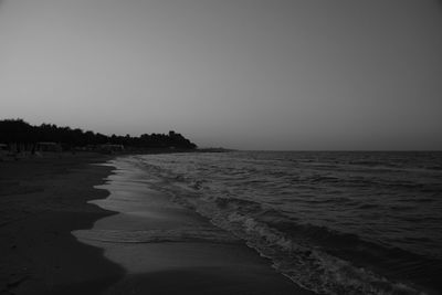 Scenic view of sea against clear sky during sunset