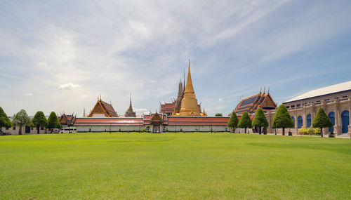 View of temple against building