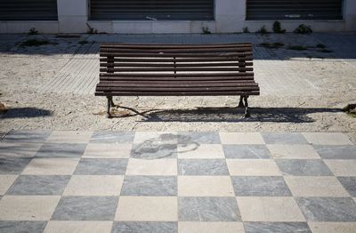 Empty bench in park