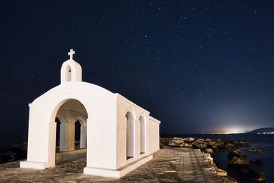 Historic building against sky at night