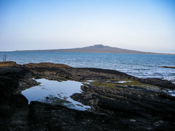 Scenic view of sea against clear sky