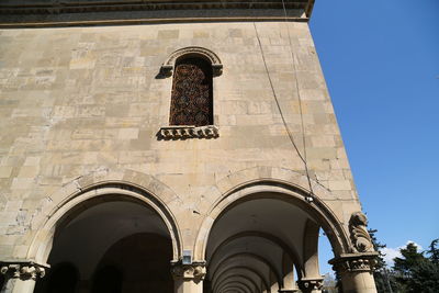 Low angle view of old building against clear sky