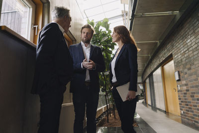 Business people talking in modern office building