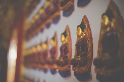 Close-up of buddha statue in temple