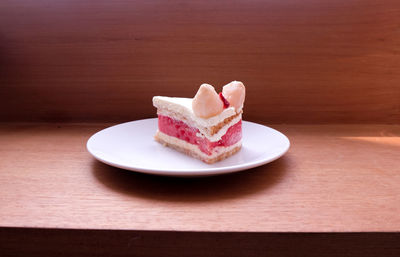 Close-up of cake in plate on table