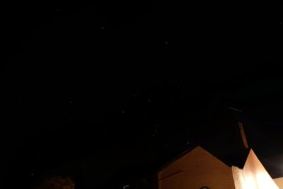Low angle view of built structure at night