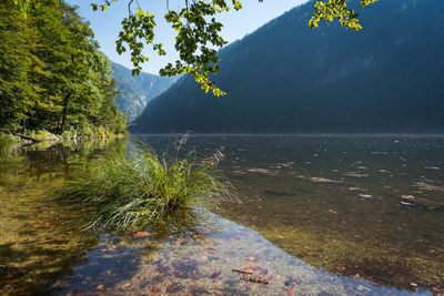 Scenic view of lake with mountains in background