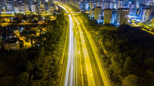 High angle view of light trails on road in city