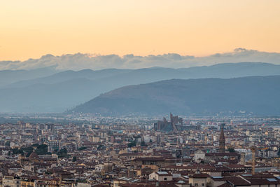 High angle view of townscape against sky during sunset