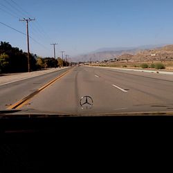 Empty road against clear sky