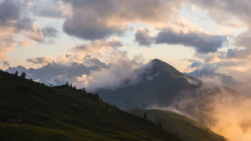 Scenic view of mountains against sky during sunset