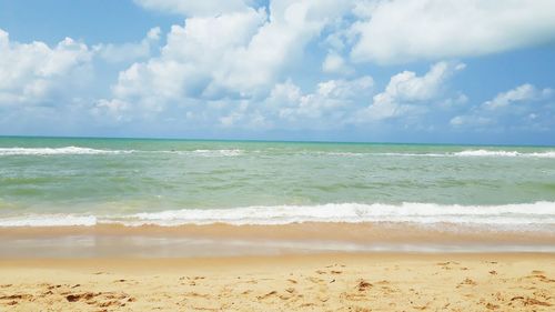 Scenic view of beach against sky