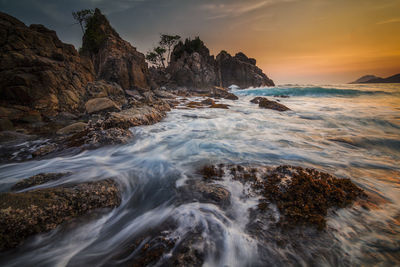 Scenic view of sea against sky during sunset