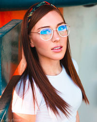 Portrait of young woman wearing sunglasses