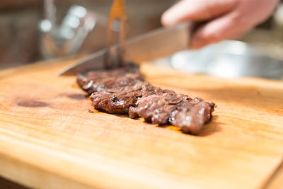 Close-up of meat on cutting board