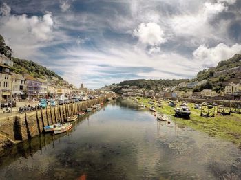 Panoramic view of river amidst trees against sky