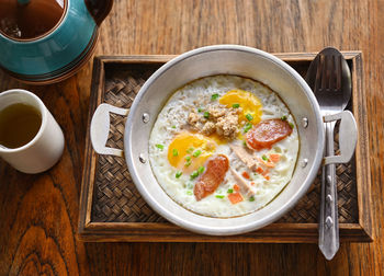 Pan fried eggs a vietnamese dish. which is influenced by the breakfast of the french food .