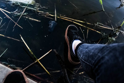 Low section of man standing outdoors