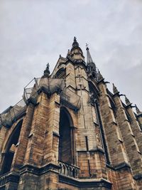 Low angle view of historic building against sky