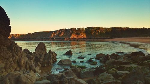 Scenic view of sea against clear sky