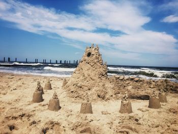 Scenic view of beach against sky
