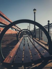 Bridge over street against clear sky