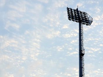 Low angle view of floodlight against sky