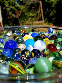 Close-up of multi colored balls on table