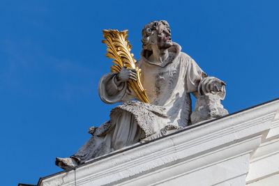 Statue with on st. stephen's cathedral  in passau, bavaria, germany 