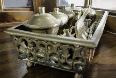 Close-up of objects on hardwood floor