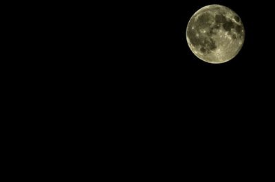 Low angle view of moon in sky