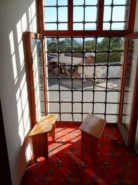 Chairs and table by window at home