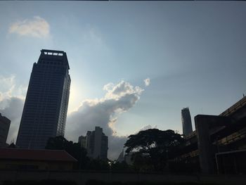 Low angle view of buildings against sky in city