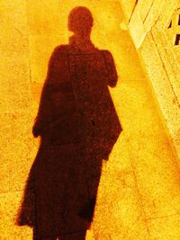 Shadow of people on wall