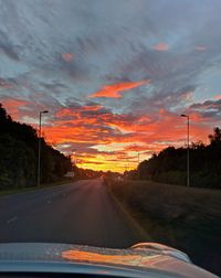 View of country road at sunset