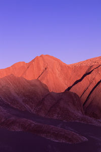 Atacama desert mountains colored at the time of blue light