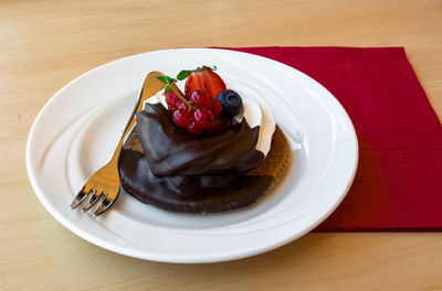 High angle view of cake in plate on table