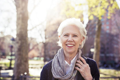 Portrait of happy senior woman outdoors