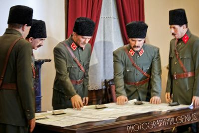 Men standing in corridor