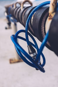 Close-up of bicycle lock on rack