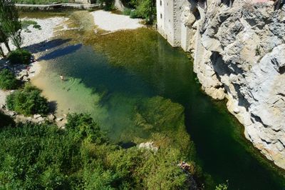 High angle view of river by cliff