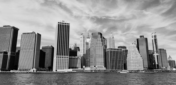 Panoramic view of modern buildings against sky